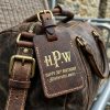 Handcrafted Full-Grain Leather Weekend Duffle with Personalized Birthday Tag Close-Up Detail